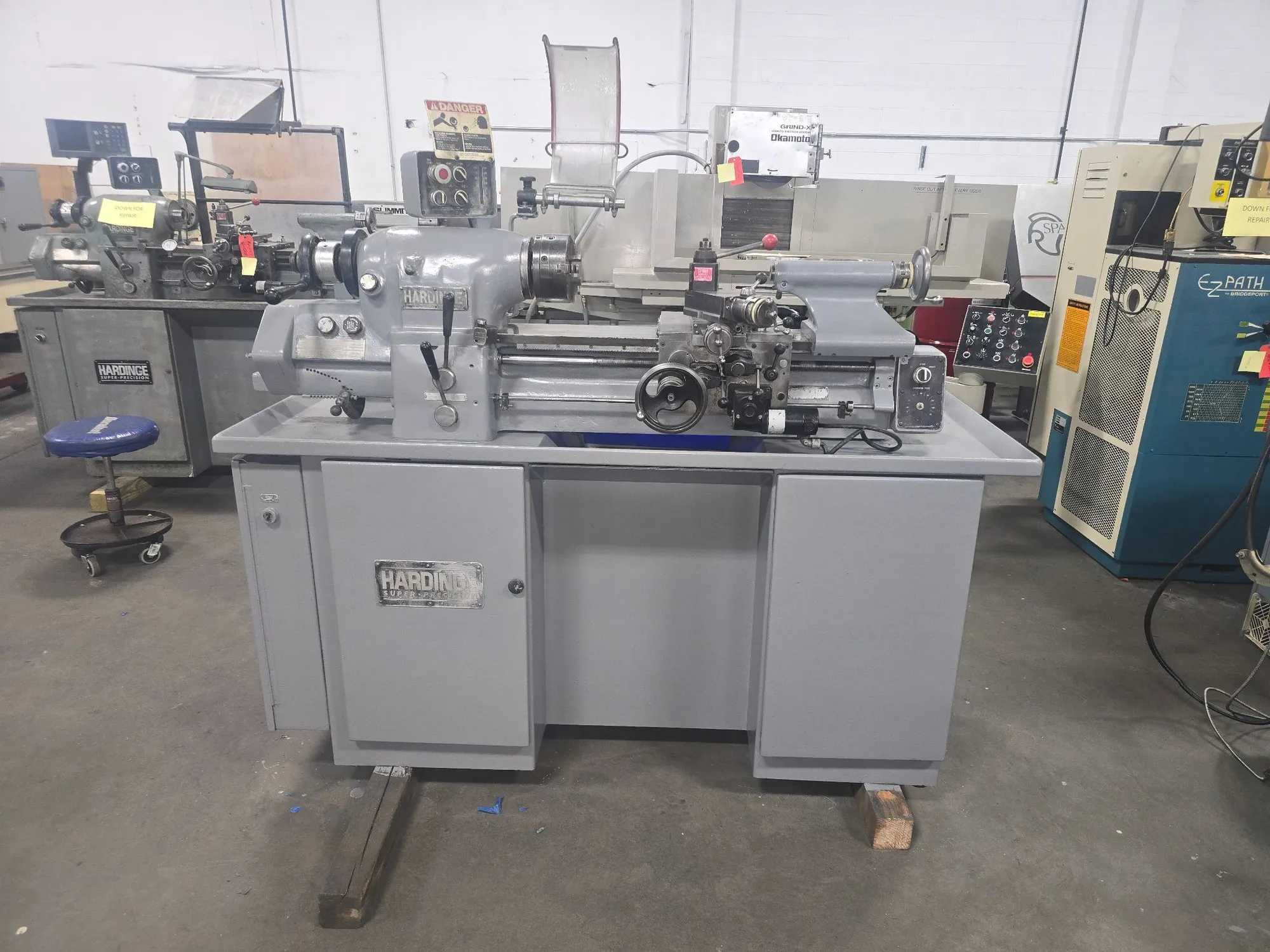 HARDINGE HLV-H-EM TOOL ROOM LATHE, 11" X 18", 125-3000 RPM, INCH/METRIC THREADING - MANUAL LATHES