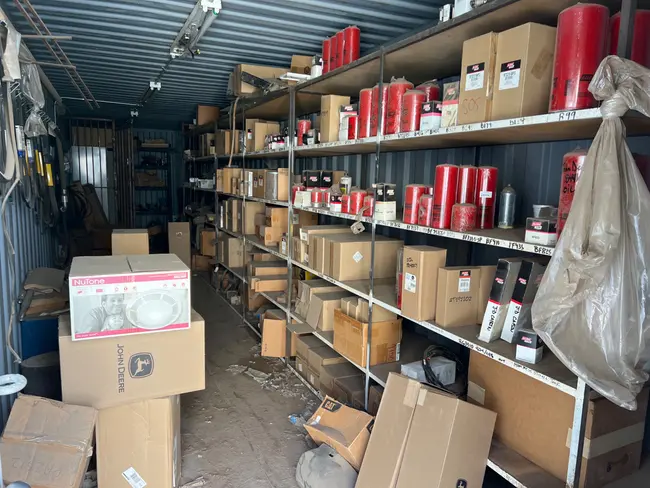 CONTENTS OF CONTAINER WITH HEAVY EQUIPMENT PARTS - undefined