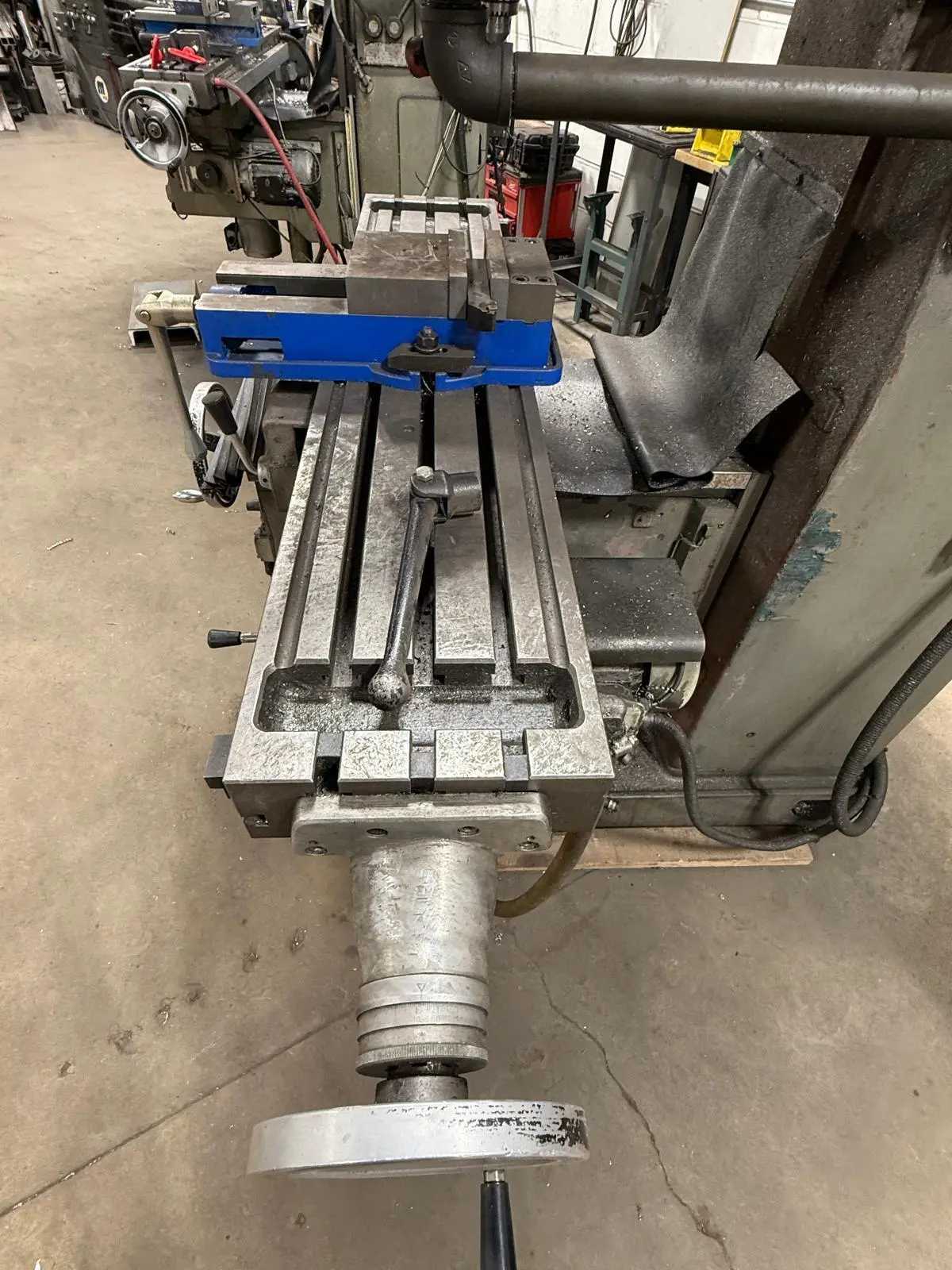 2007 FIRST LC-20VSG VERTICAL KNEE MILLING MACHINE 575V 4500RPM 52"X10" TABLE DRO - VERTICAL MILLING MACHINES