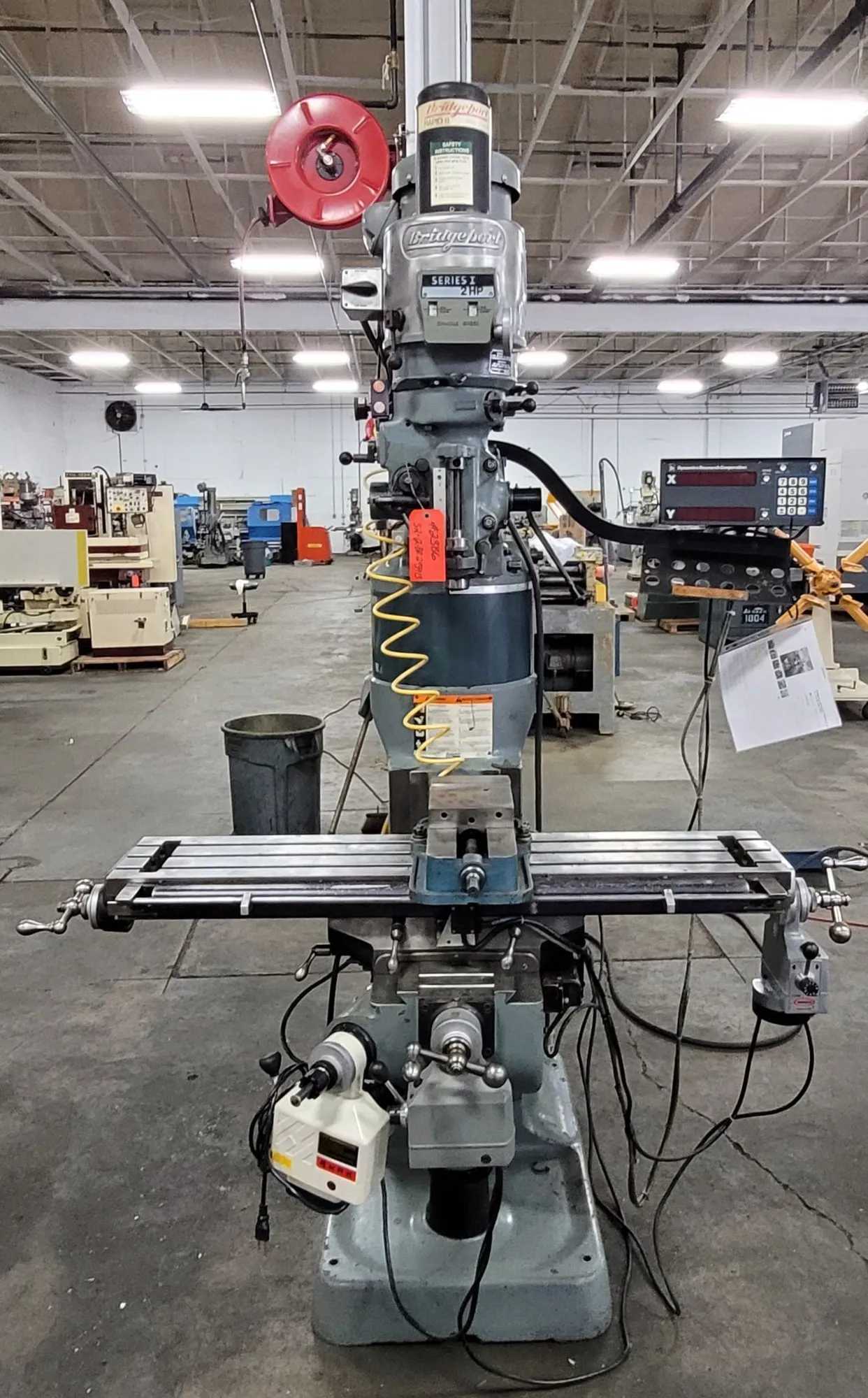 BRIDGEPORT 2HP MILL W/8" RISER, SERVO PF, DRO, PDB - PRECISION MACHINING POWERHOUSE! - VERTICAL MILLING MACHINES