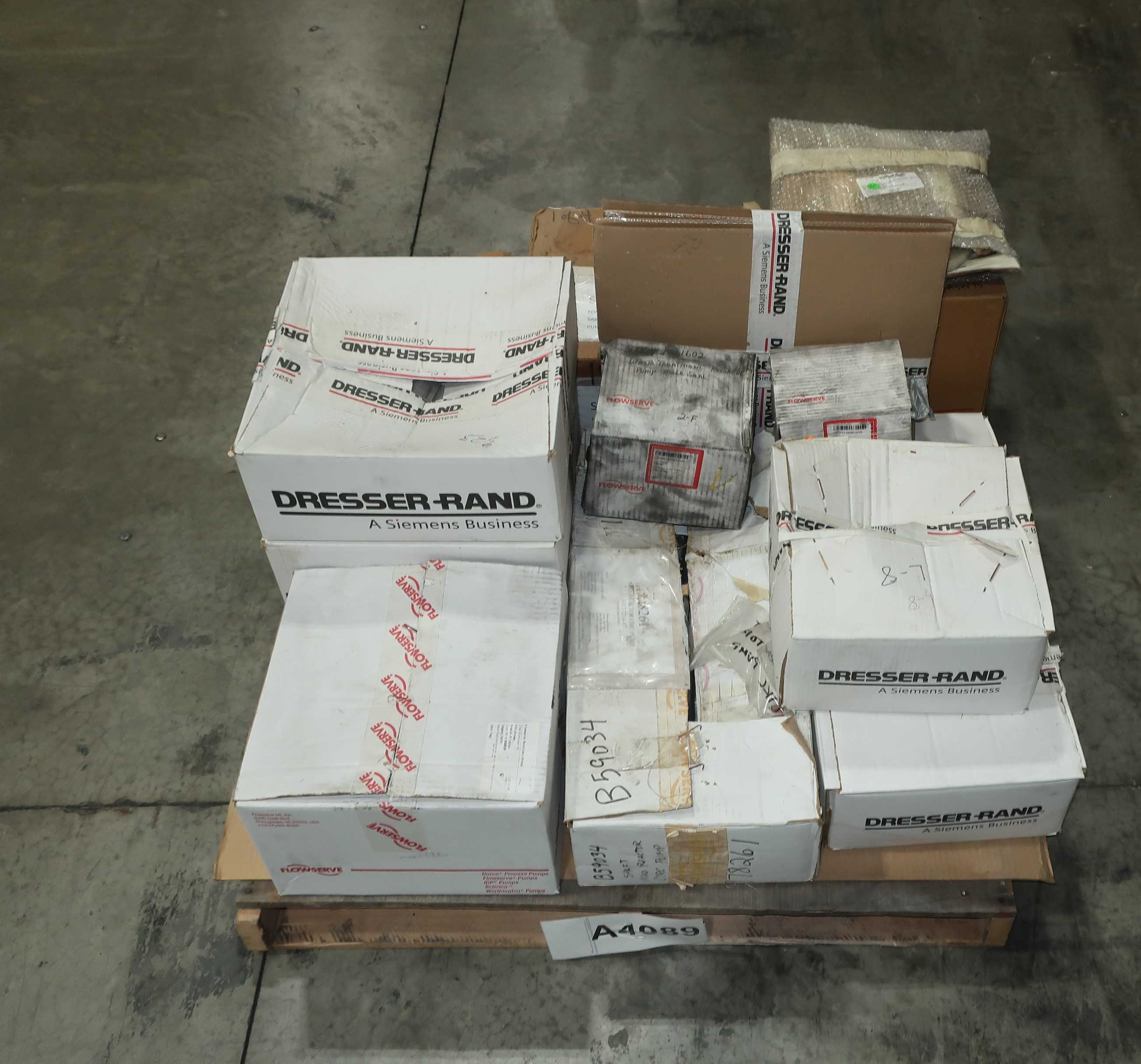 PALLET OF ASSORTED PUMP PARTS, DIAPHRAGM, RINGS, SEALS, COVERS, DRESSER RAND, FLOWSERVE - PUMP REPLACEMENT PARTS