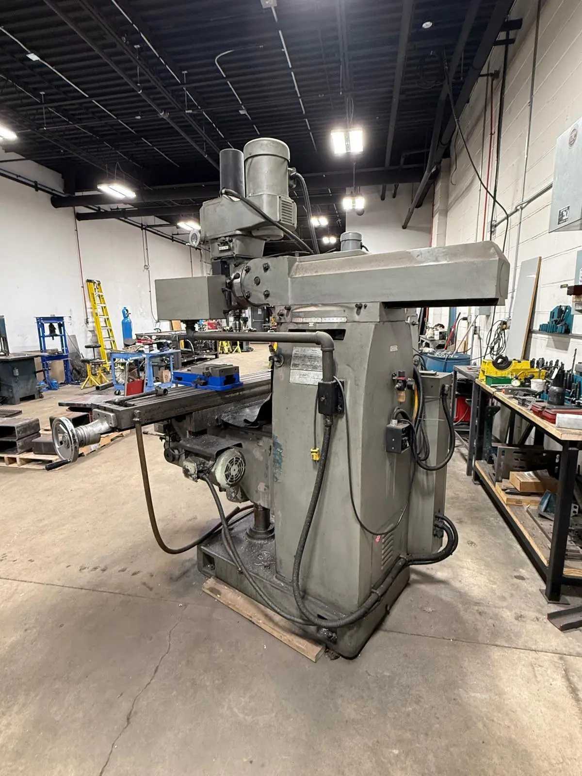 2007 FIRST LC-20VSG VERTICAL KNEE MILLING MACHINE 575V 4500RPM 52"X10" TABLE DRO - VERTICAL MILLING MACHINES