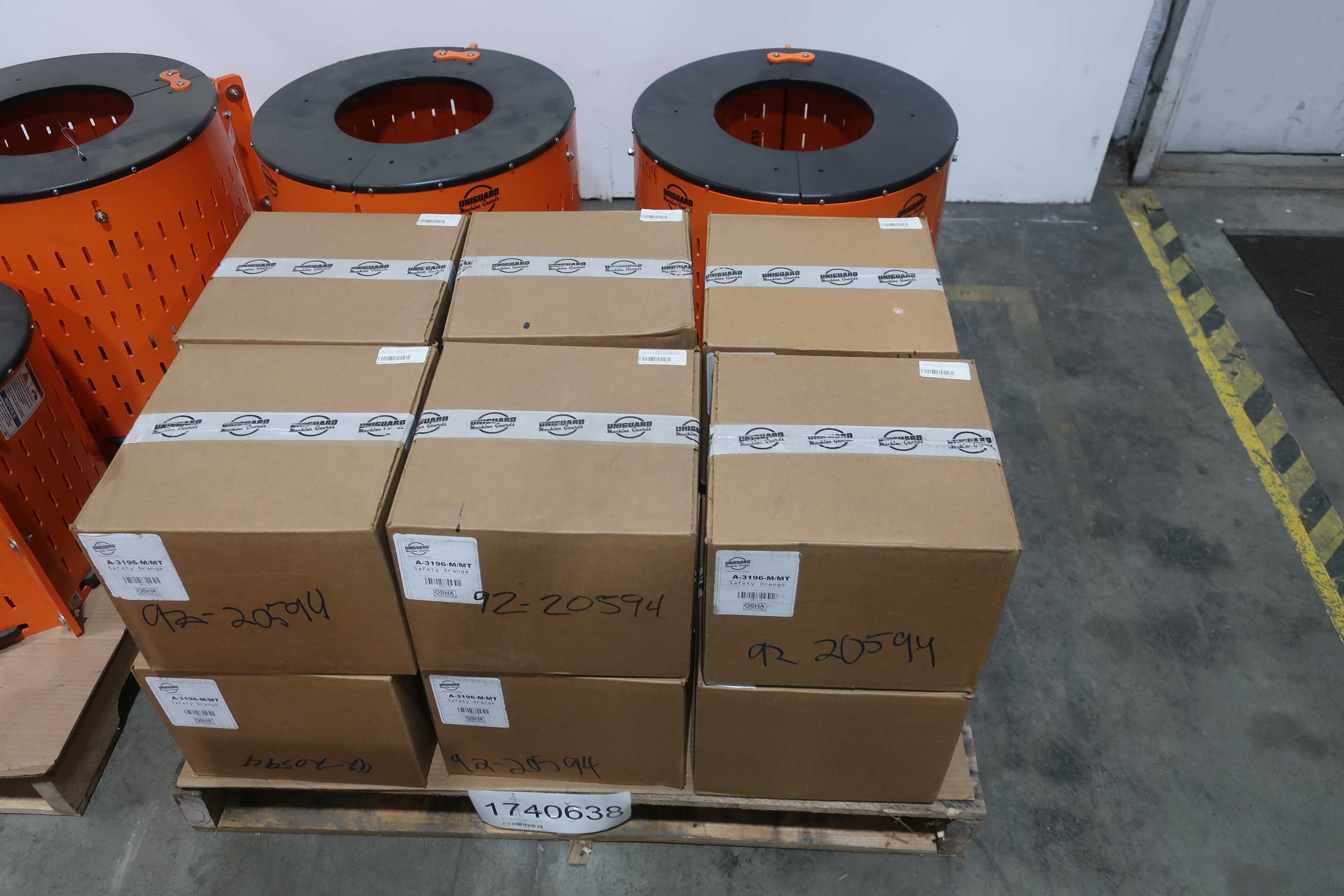 SKU 1740638 - 3 PALLETS OF ASSORTED SAFTEY ORANGE UNIGUARD BARREL GUARD ADAPTER PLATES - PUMP REPLACEMENT PARTS