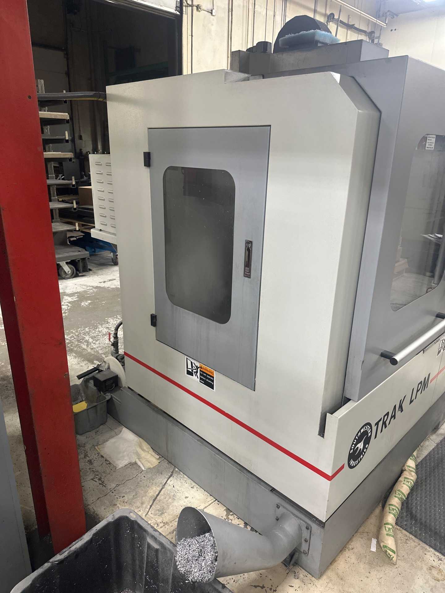 SOUTHWESTERN INDUSTRIES TRAK LPM VMC, 31X18.5X21IN, 8K RPM, CAT40, 16 ATC, PROTOTRAK PMX CNC - MILLING MACHINES