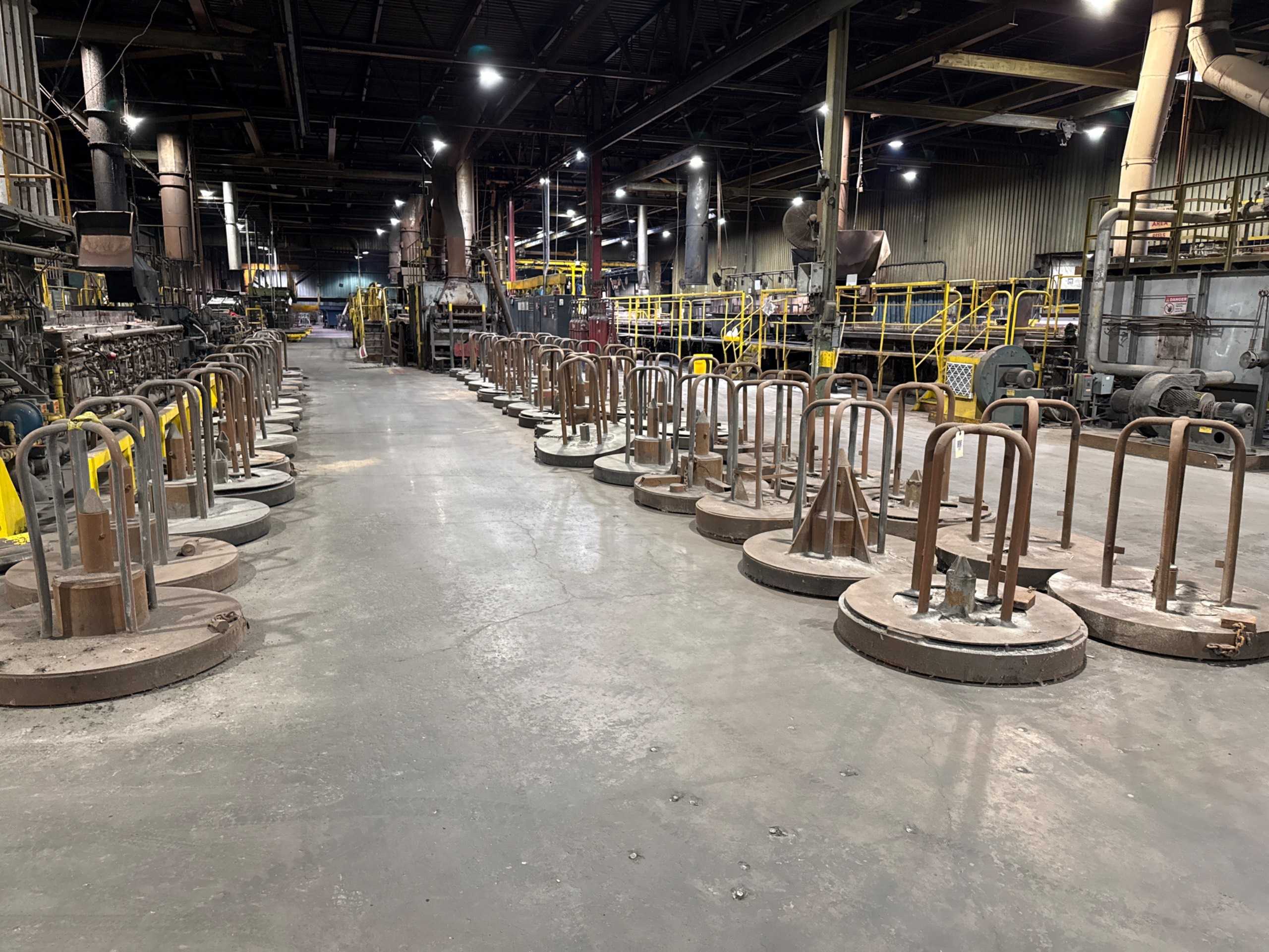 BULK QTY OF ROTATING WIRE CARRIERS - WIRE MANUFACTURING EQUIPMENT
