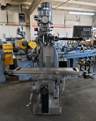 SHARP HMV VERTICAL MILL WITH 3-AXIS PROTOTRAK PLUS CONTROLLER, 3HP HEAD, 51" X 10" TABLE - VERTICAL MILLING MACHINES