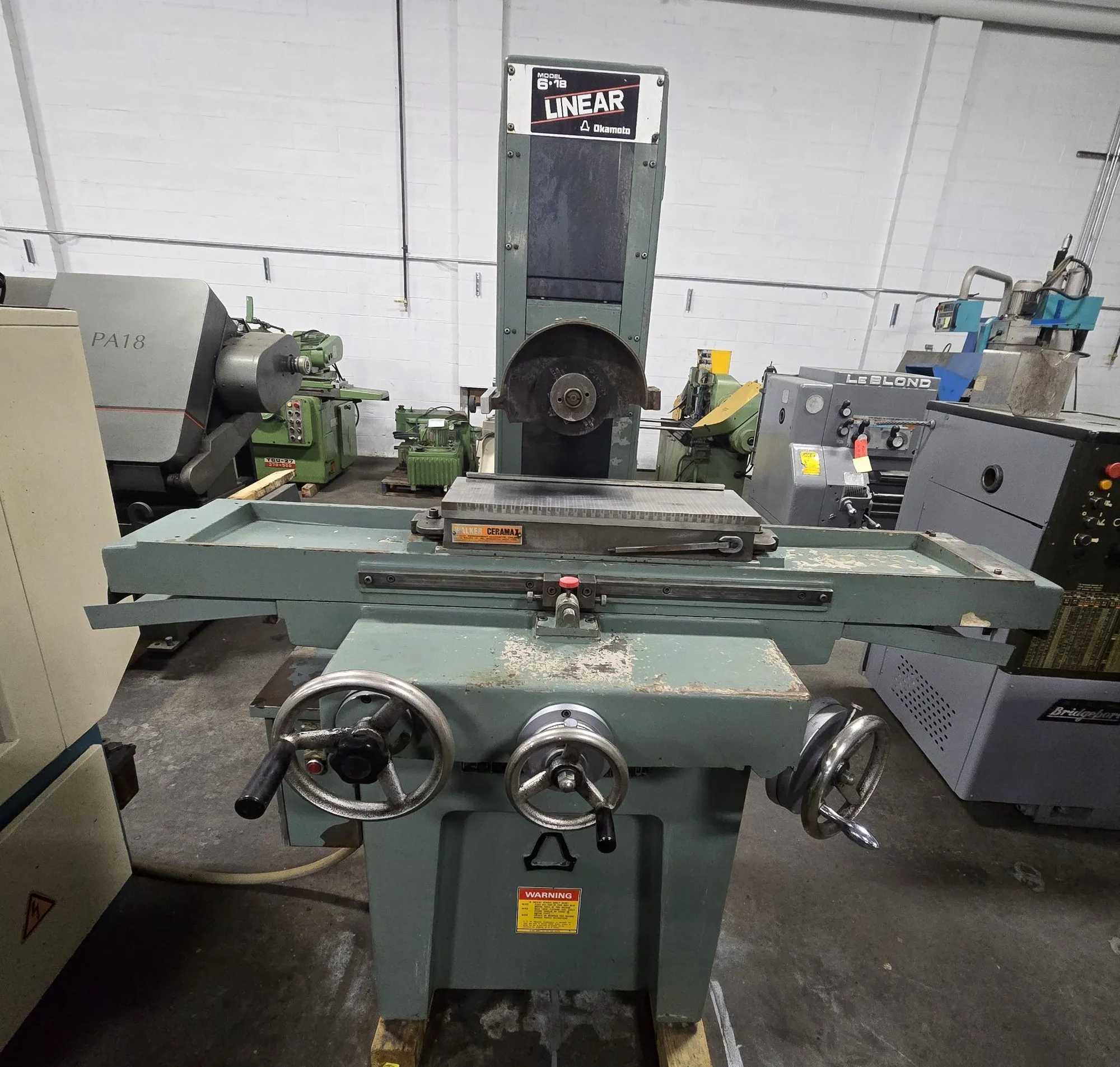 OKAMOTO LINEAR 618 MANUAL SURFACE GRINDER, 6" X 18" CHUCK, 2 HP, LINEAR BALL BEARING WAYS - SURFACE GRINDERS