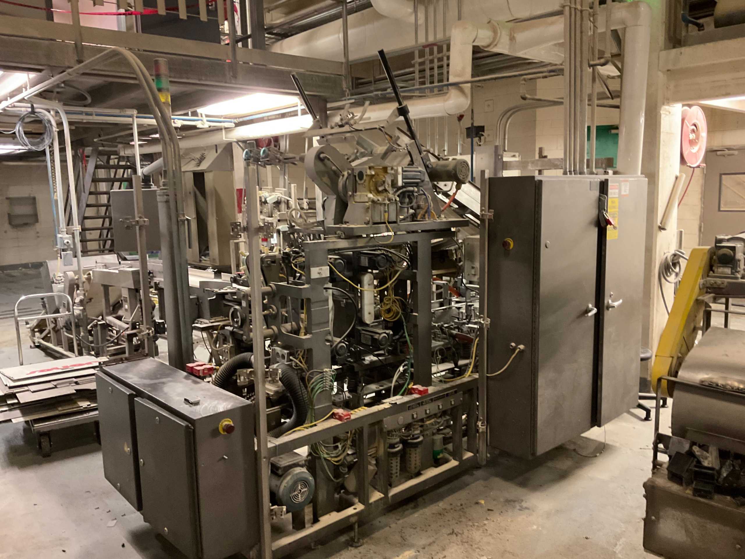 TRIANGLE FLEXCELL CARTONING MACHINE - PACKAGING TRIANGLE FLEXCELL CARTONING MACHINE - PACKAGING