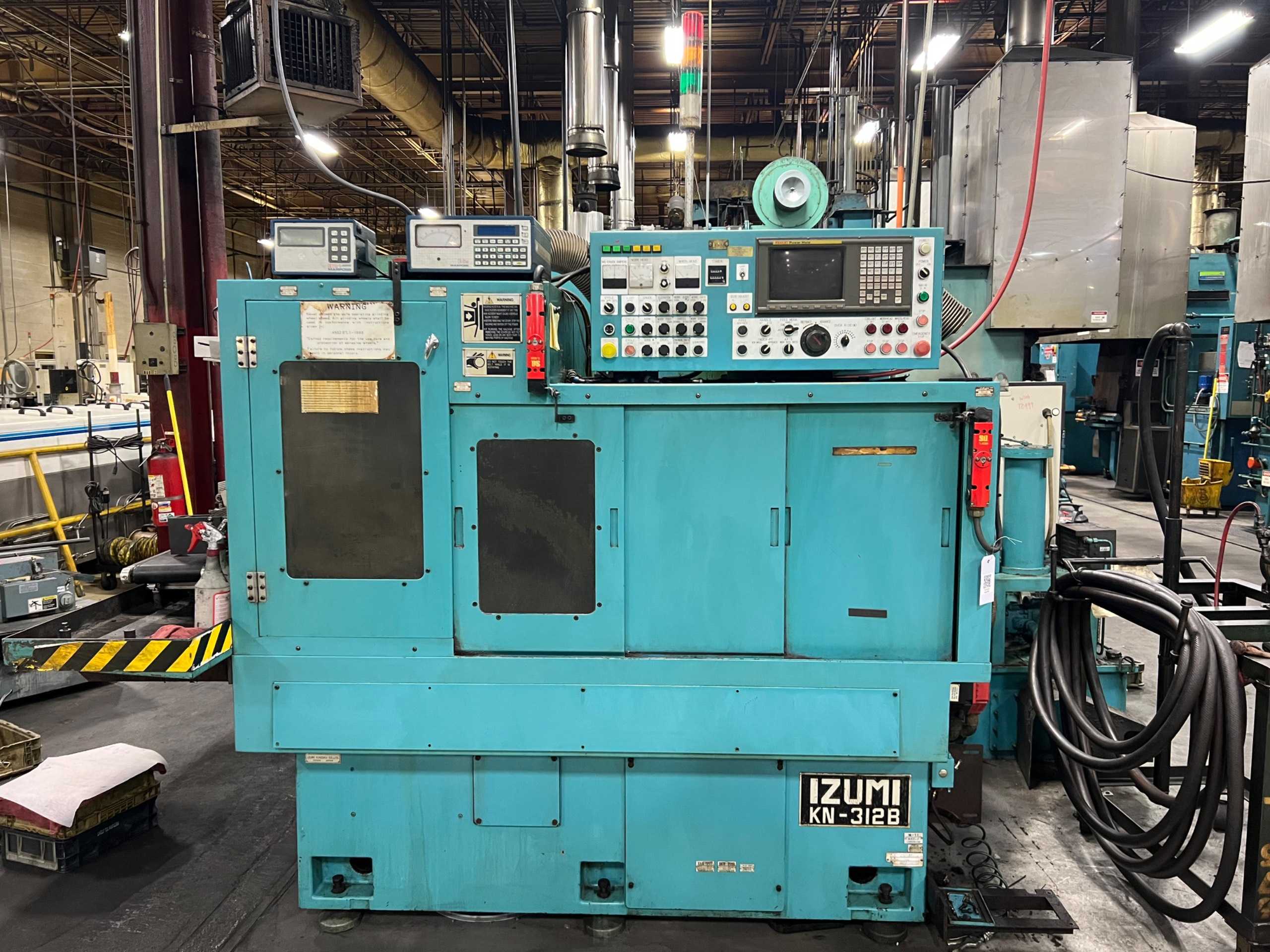 IZUMI KINZOKU KN-312B CYLINDRICAL GRINDER - CYLINDRICAL GRINDERS