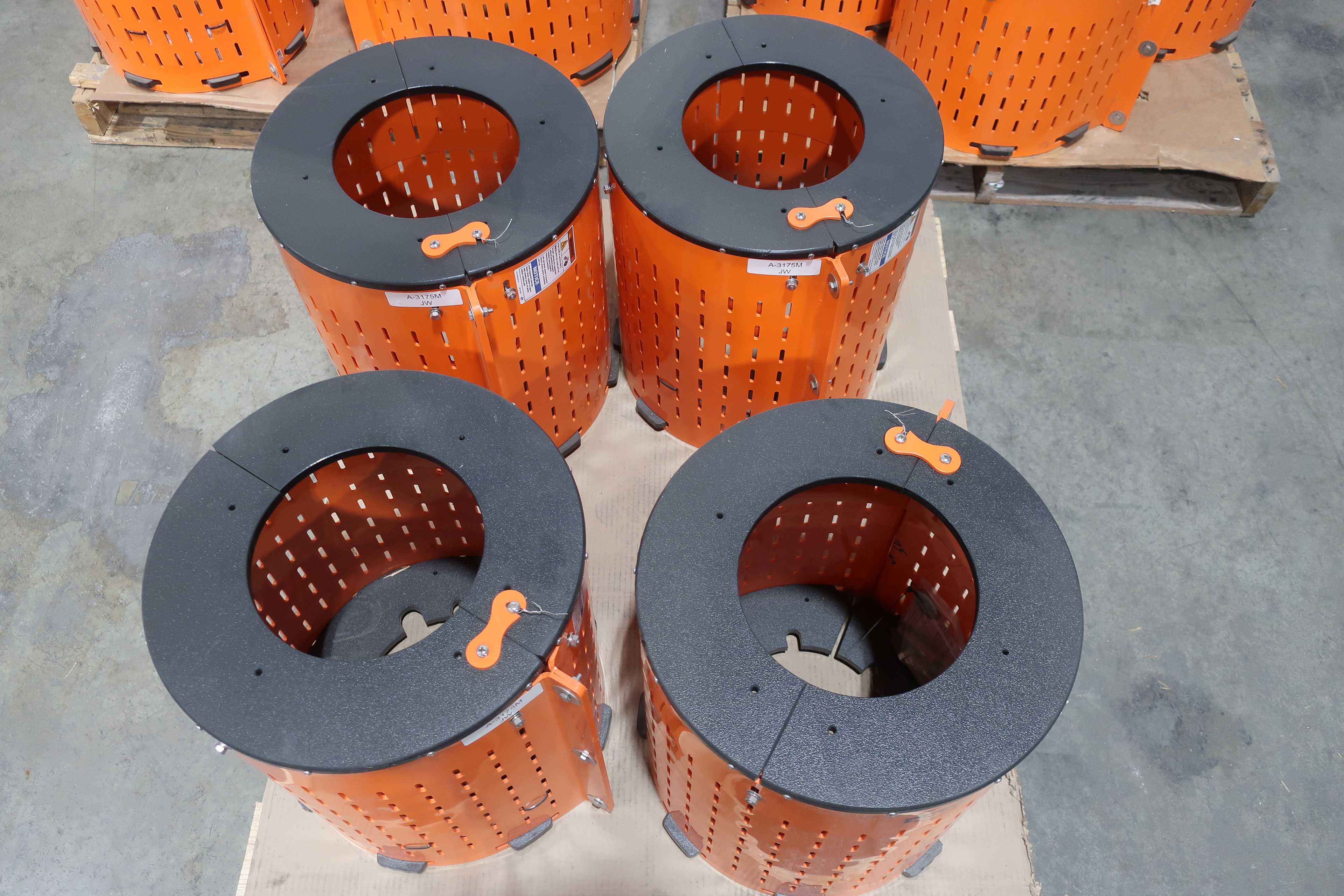 SKU 1740661 - 3 PALLETS OF ASSORTED SAFTEY ORANGE UNIGUARD BARREL GUARD ADAPTER PLATES - PUMP REPLACEMENT PARTS