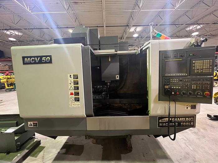 2010 SAMSUNG MCV 50 VERTICAL MACHINING CENTER, FANUC 0I-MD, 10K RPM, 30 ATC, CAT 40, COOLANT - VERTICAL MACHINING CENTERS