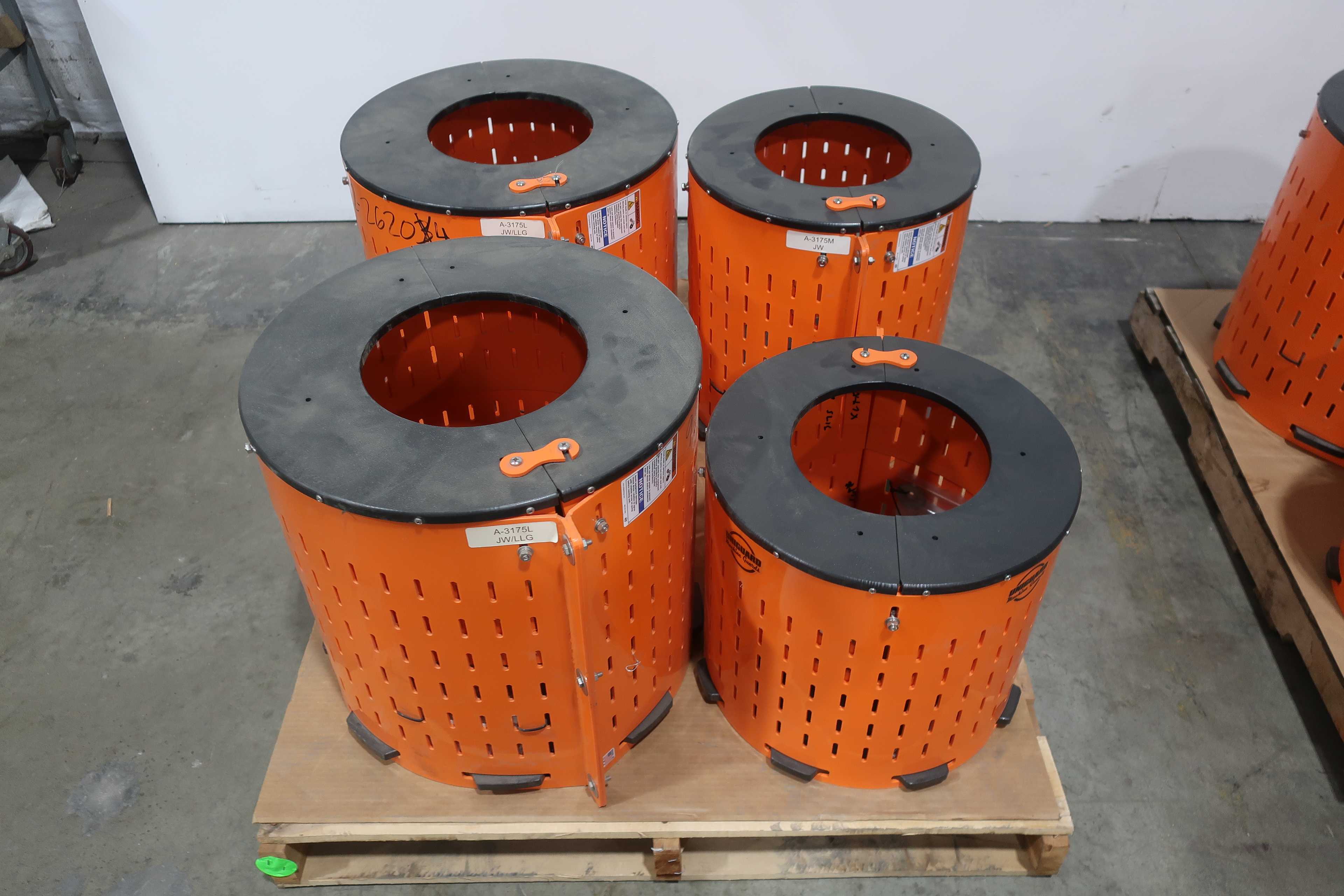 SKU 1740679 - 3 PALLETS OF ASSORTED SAFTEY ORANGE UNIGUARD BARREL GUARD ADAPTER PLATES - PUMP REPLACEMENT PARTS