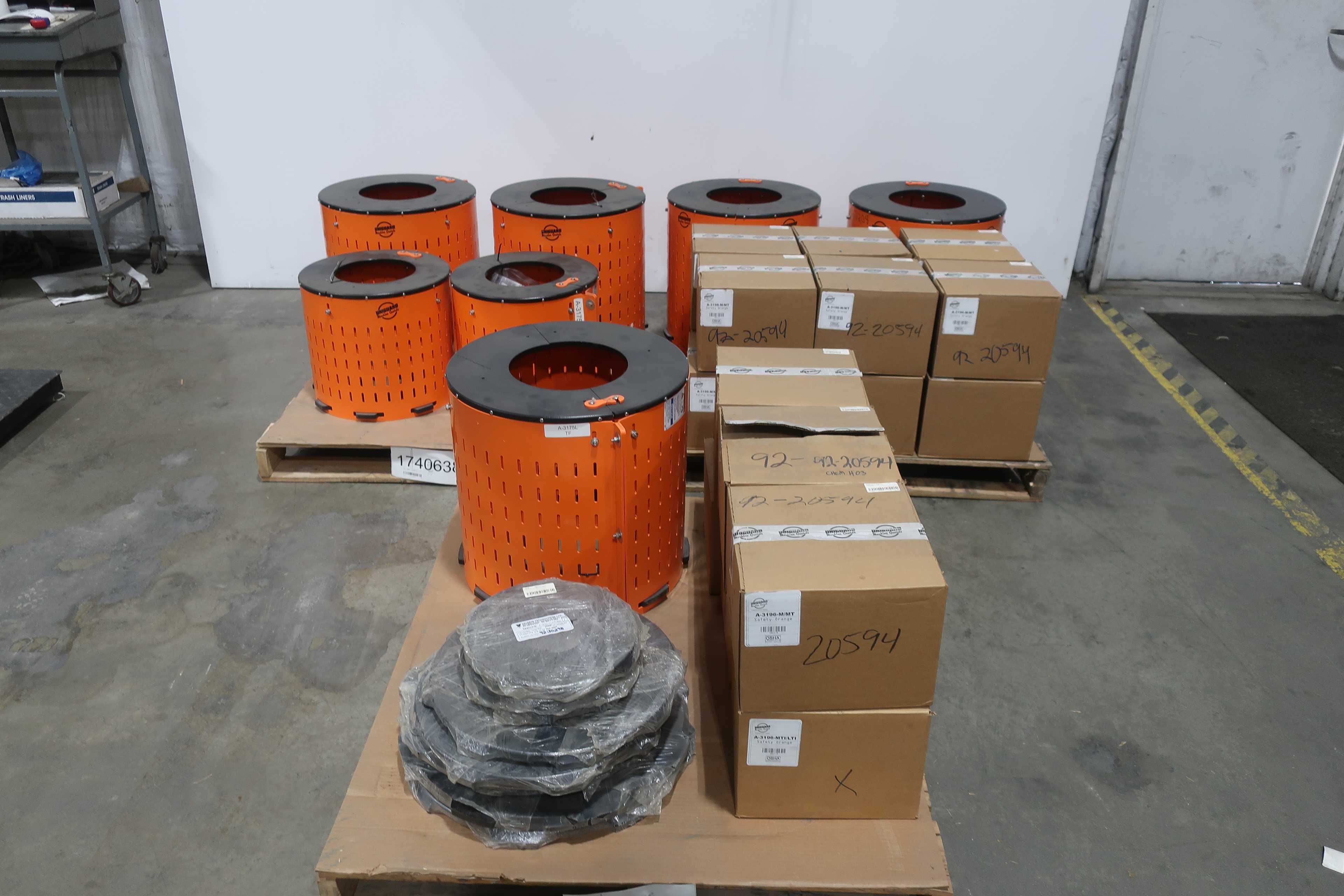 SKU 1740638 - 3 PALLETS OF ASSORTED SAFTEY ORANGE UNIGUARD BARREL GUARD ADAPTER PLATES - PUMP REPLACEMENT PARTS