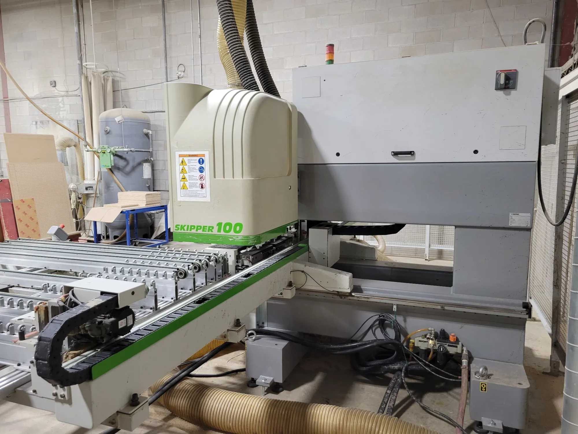 2006 BIESSE SKIPPER 100 CNC THROUGHFEED DRILLING AND MACHINING CENTER, 4.8HP, DOUBLE-SIDED - CNC MACHINING CENTERS