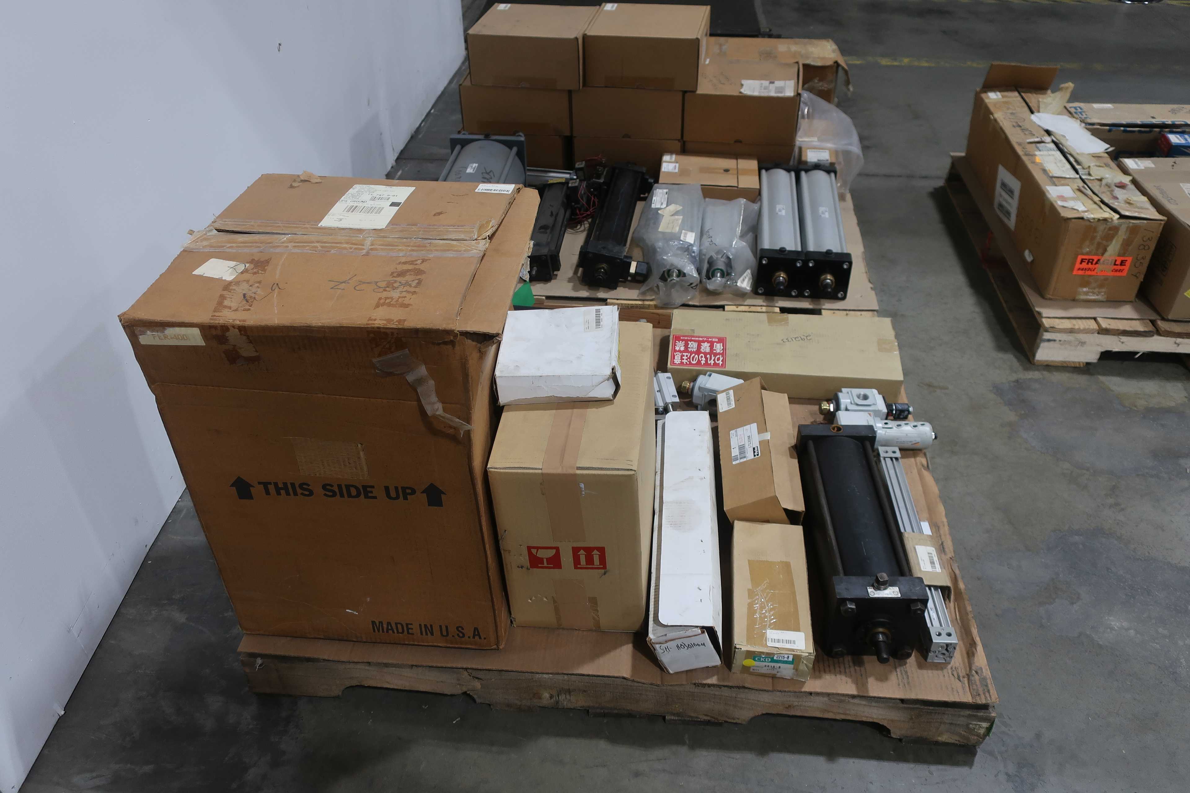 SKU 1738584 - 4 PALLETS OF ASSORTED PNEUMATICS - PNEUMATIC PARTS