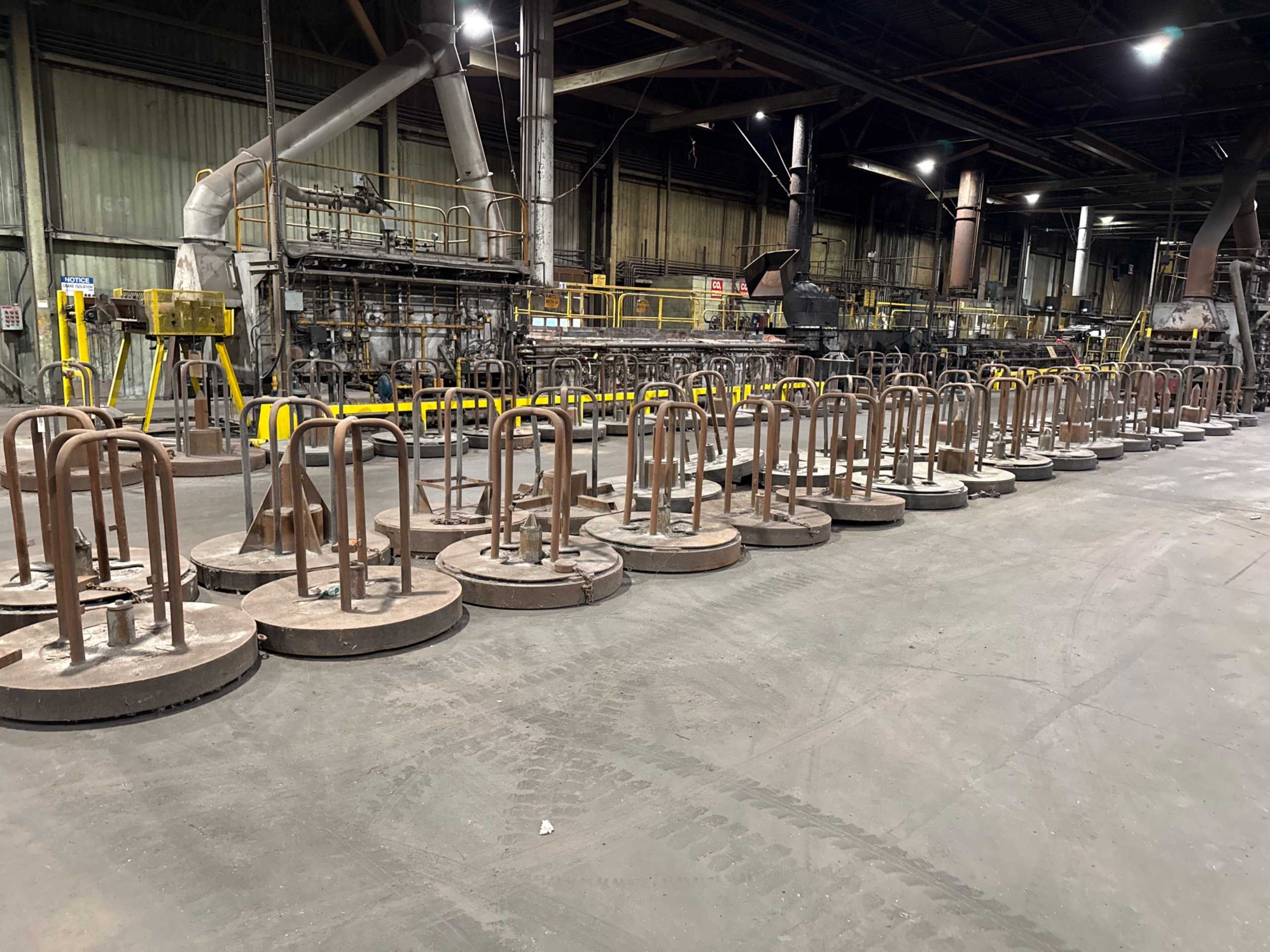 BULK QTY OF ROTATING WIRE CARRIERS - WIRE MANUFACTURING EQUIPMENT