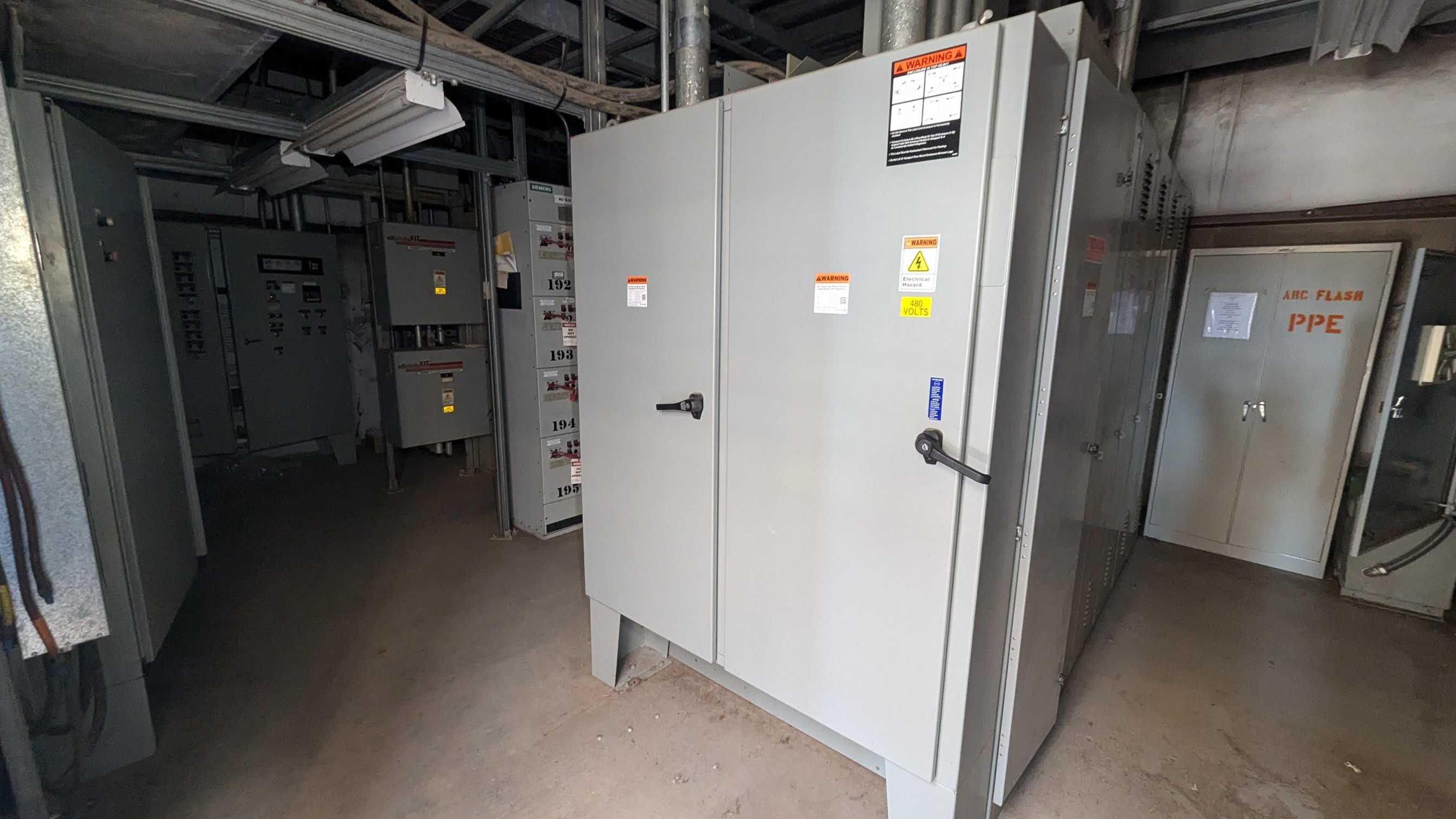 ELECTRICAL ROOM CONTAINING MOTOR CONTROL CENTERS, PANELS, TRANSFORMERS, WIRE - ELECTRICAL COMPONENTS