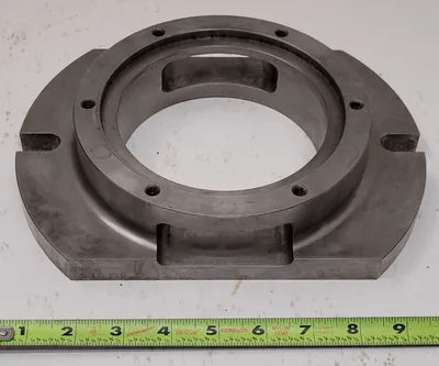 MOUNTING PLATE, 7" DIAMETER, BASE 10"X7", THROUGH HOLE ID 5" - MACHINE TOOLING