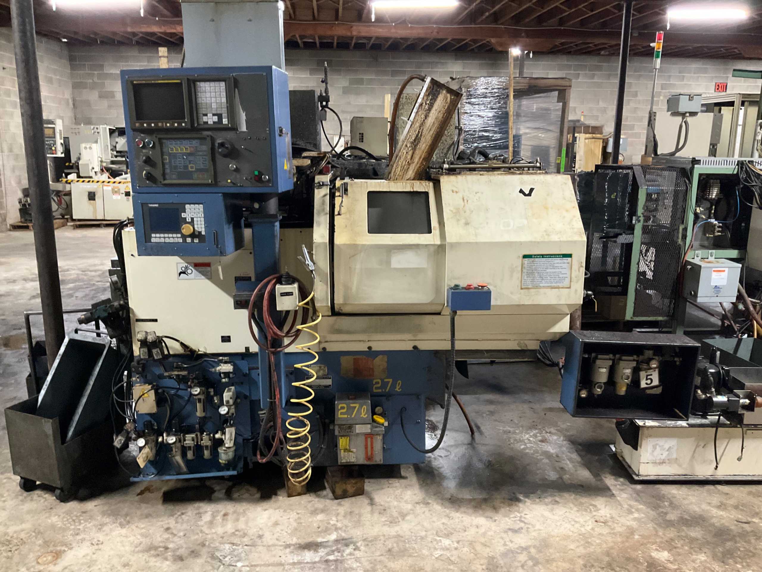 2003 TAKAMATSU TOP-T CNC LATHE WITH GANTRY-STYLE ROBOTIC LOADER - CNC LATHES 2003 TAKAMATSU TOP-T CNC LATHE WITH GANTRY-STYLE ROBOTIC LOADER - CNC LATHES