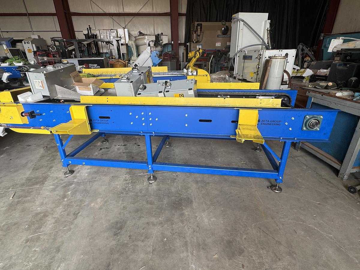2023 ZETA GROUP MOTORIZED PLASTIC TOP CONVEYOR, 30"W X 137"L, 37 FPM, 3/4 HP, FANUC SYNC - CONVEYORS