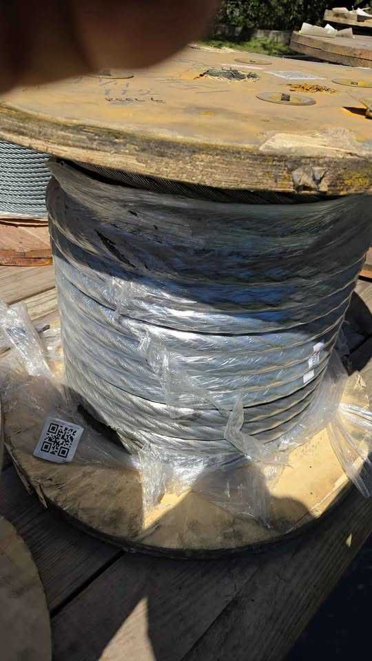112' SPOOL OF 1 1/4" STEEL CABLE - CABLE