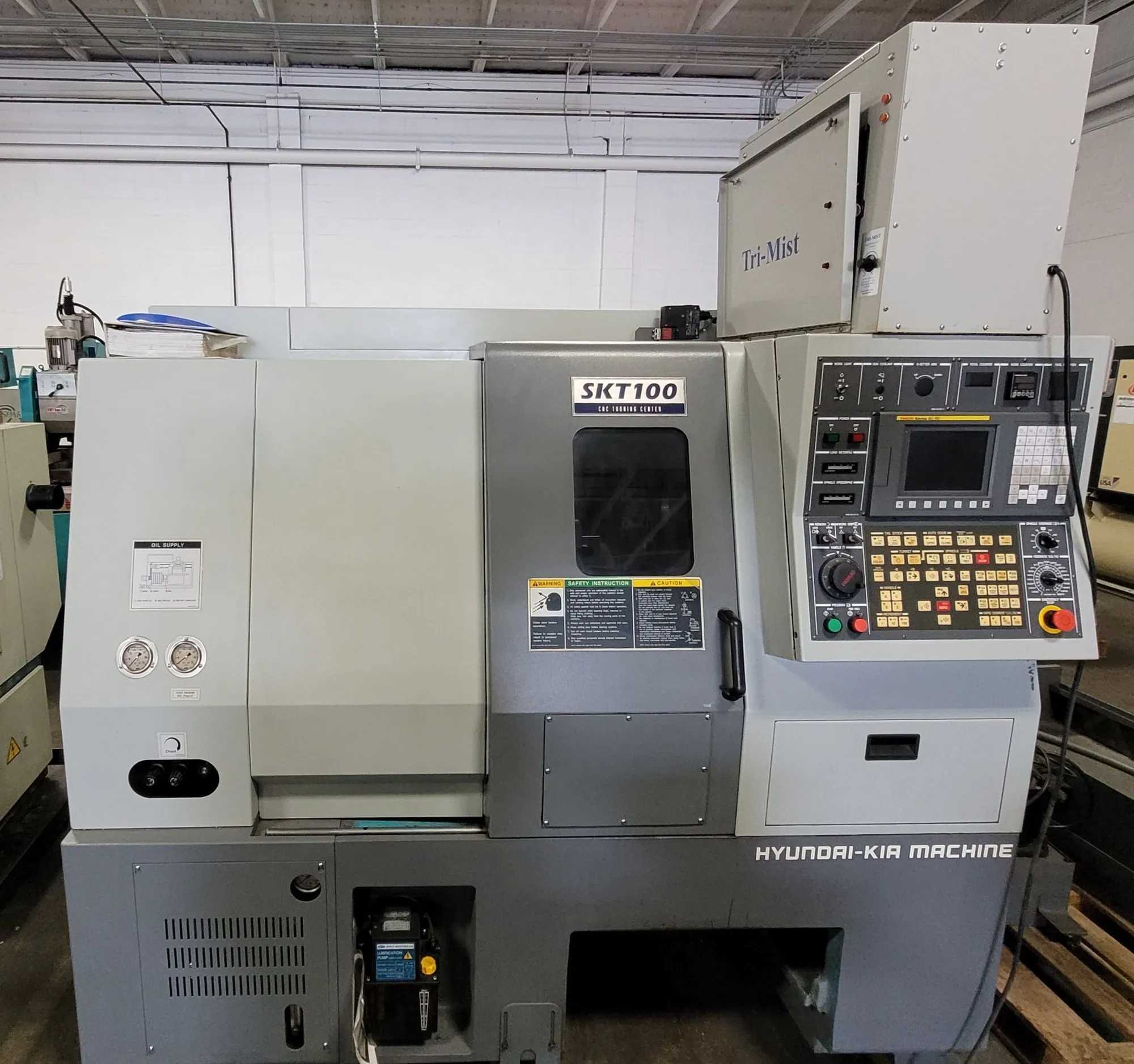 HYUNDAI-KIA SKT100 CNC TURNING CENTER, 12 POS. TURRET, 6000RPM, 21.7" SWING, 8377LBS - CNC LATHES