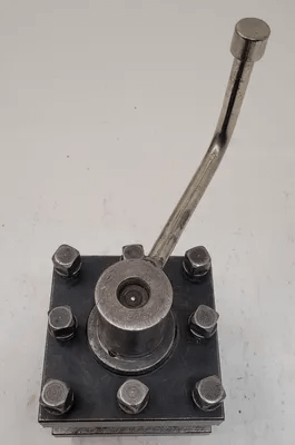 LATHE TOOL POST HOLDER - BASE: H: 7IN W: 5-1/4IN L: 5-1/4IN GAP: 1.5IN THICK: 1IN - MACHINE TOOLING