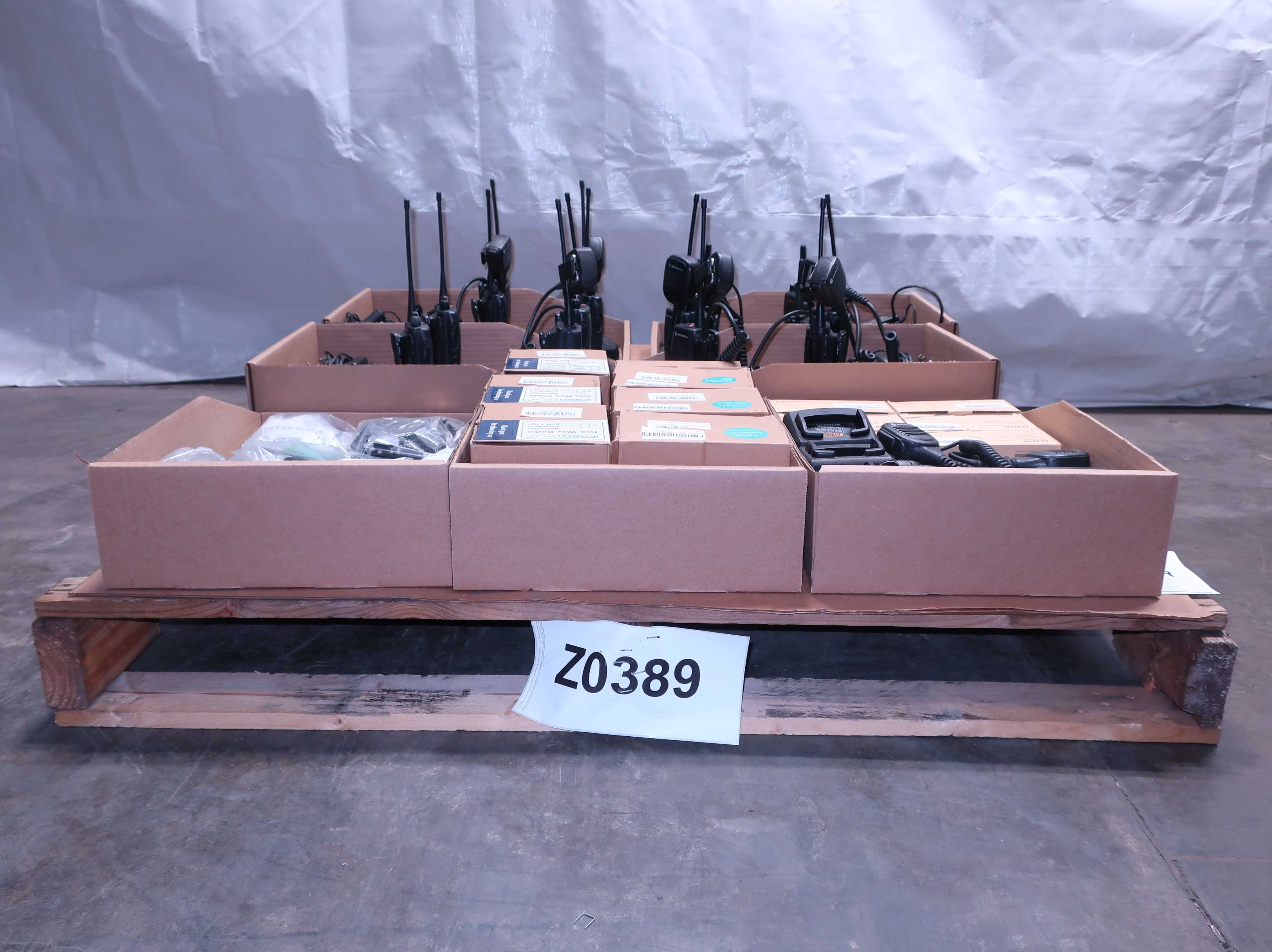 PALLET OF ASSORTED WALKIE TALKIES AND ACCESSORIES - TELECOMMUNICATION