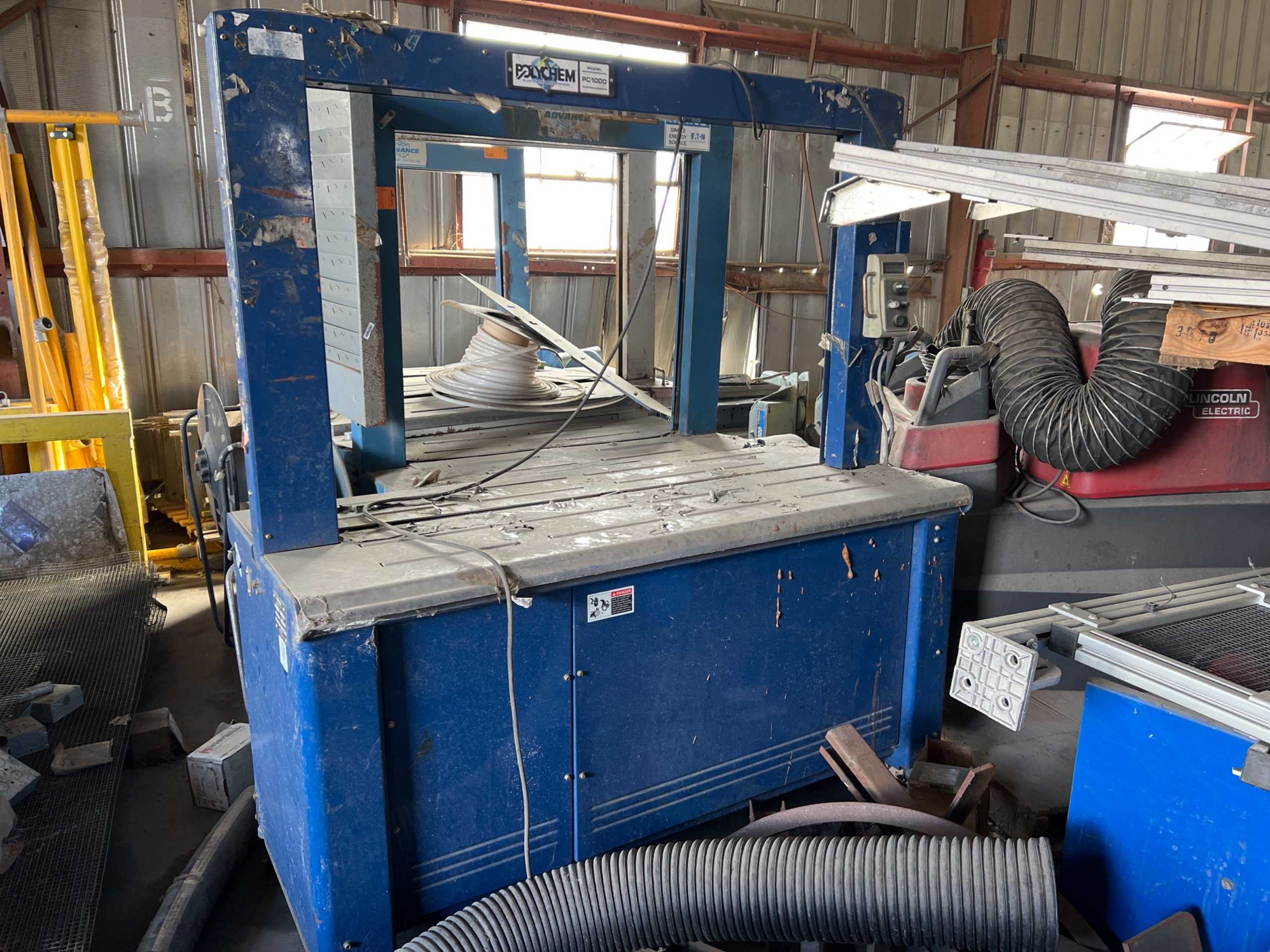 2012 POLYCHEM PC1000 AUTOMATIC ARC STRAPPER - PACKAGING